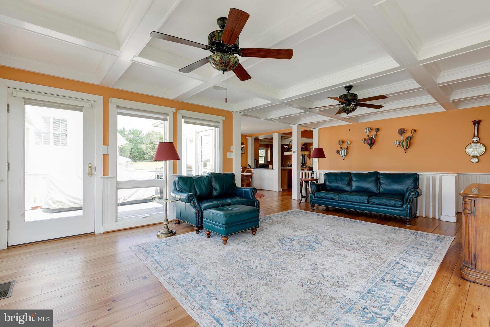 2379 Pendleton Road Mineral, VA 23117 - Photo 18 of 55 a living room with furniture a ceiling fan and a rug
