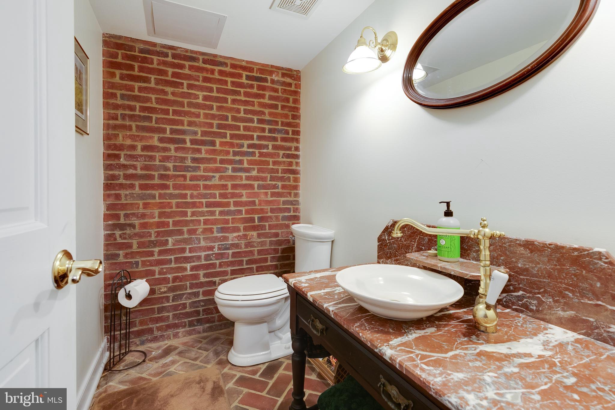 2379 Pendleton Road Mineral, VA 23117 - Photo 35 of 55 a bathroom with a granite countertop toilet and a sink