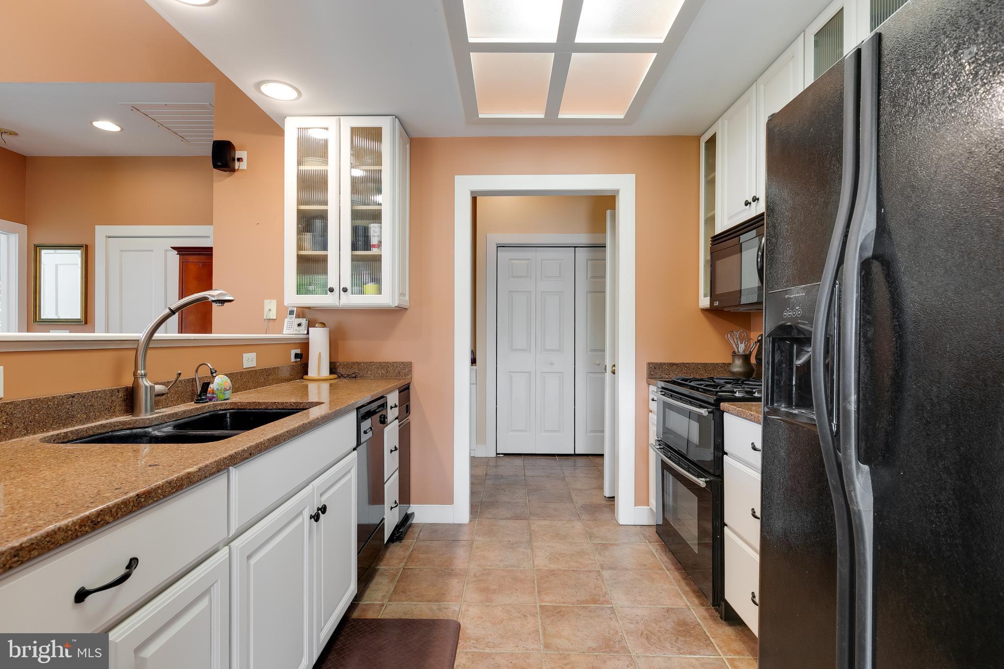 2379 Pendleton Road Mineral, VA 23117 - Photo 40 of 55 a kitchen with a sink stove and refrigerator