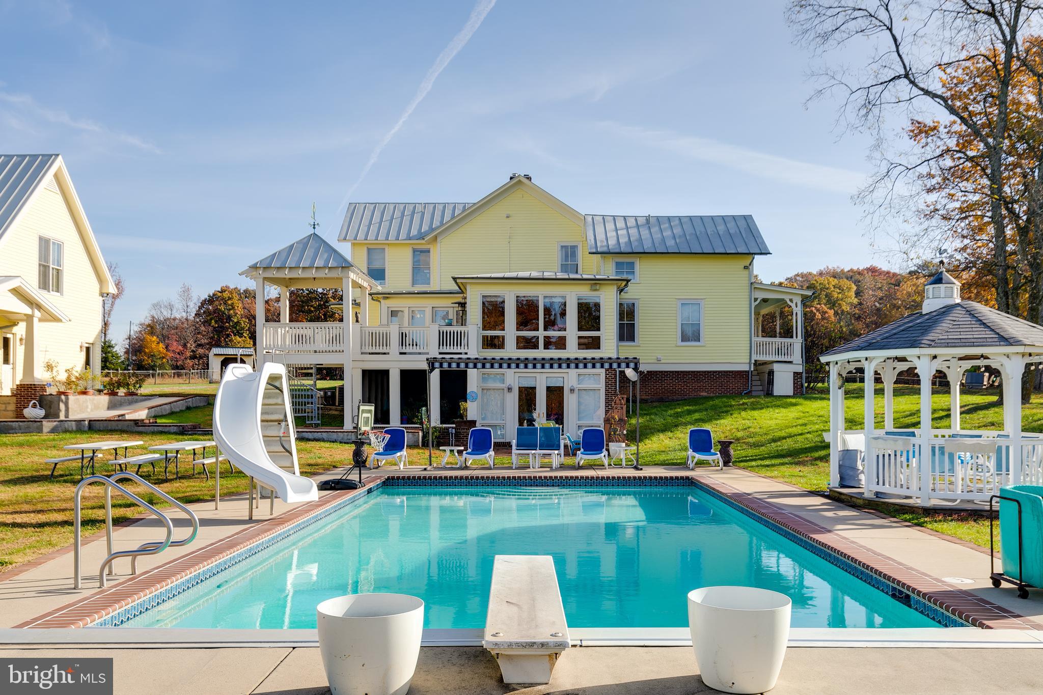 2379 Pendleton Road Mineral, VA 23117 - Photo 4 of 55 an aerial view of an house with a swimming pool