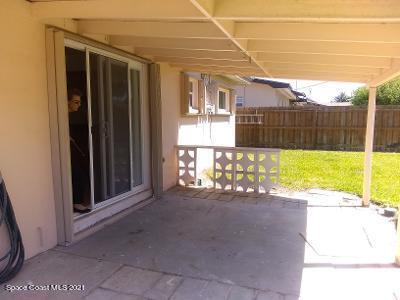 535 Lee Avenue, Unit A Satellite Beach, FL 32937 - Photo 12 of 12 a view of a backyard