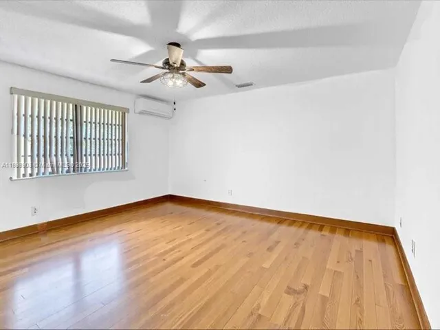 a bedroom with a bed and furniture