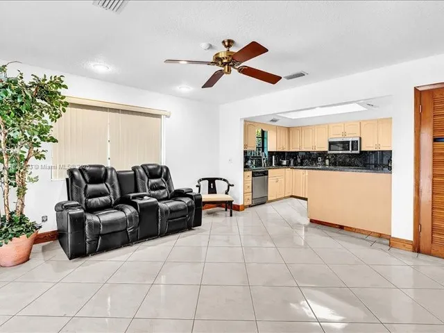 a view of a livingroom with furniture