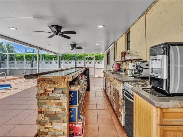 a view of a chairs and table in a patio