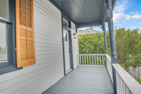 a picture of a bench in front of a wall