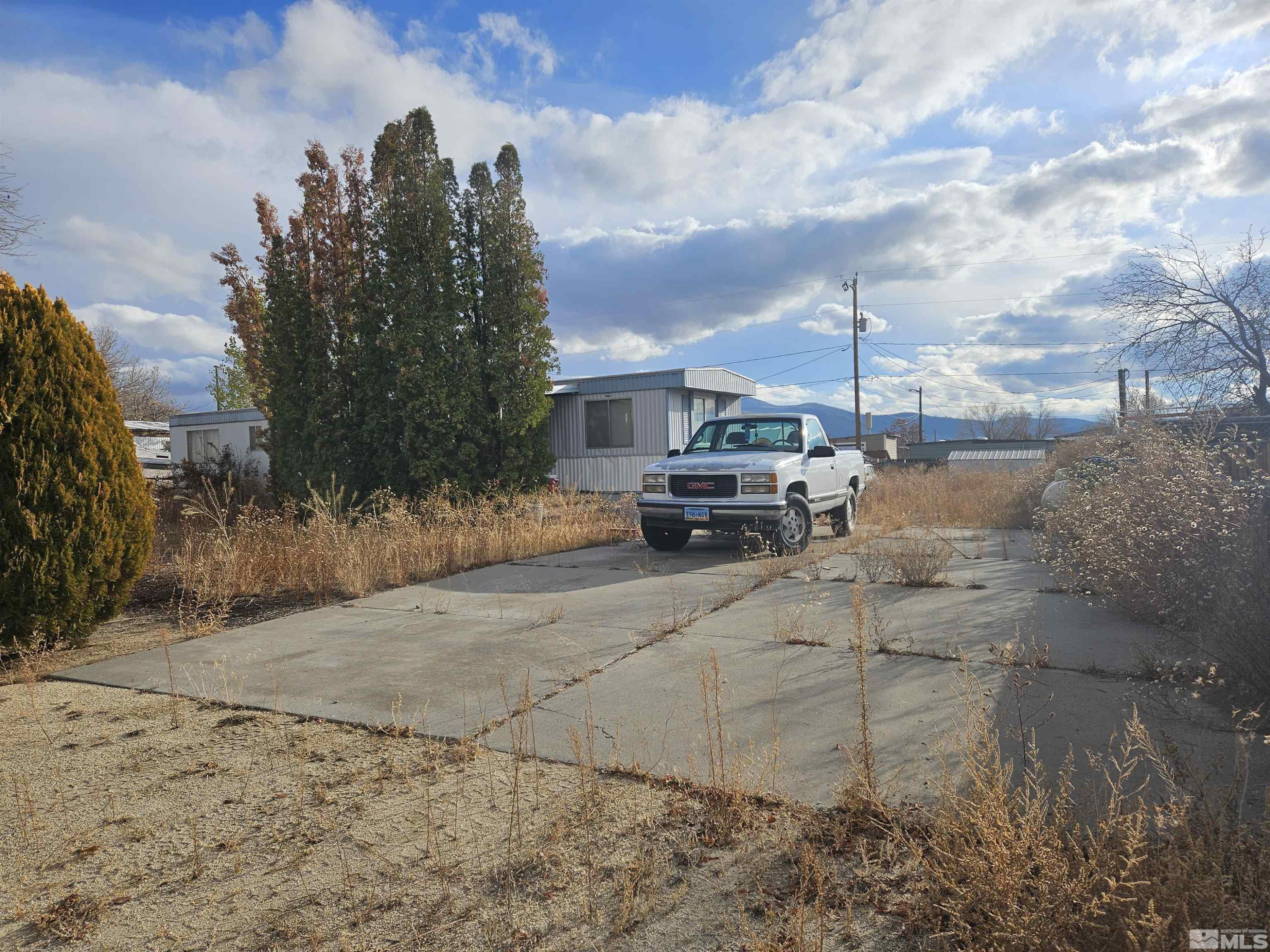3765 Hummingbird Drive Reno, NV 89508 - Photo 12 of 13 a car parked on the side of the road