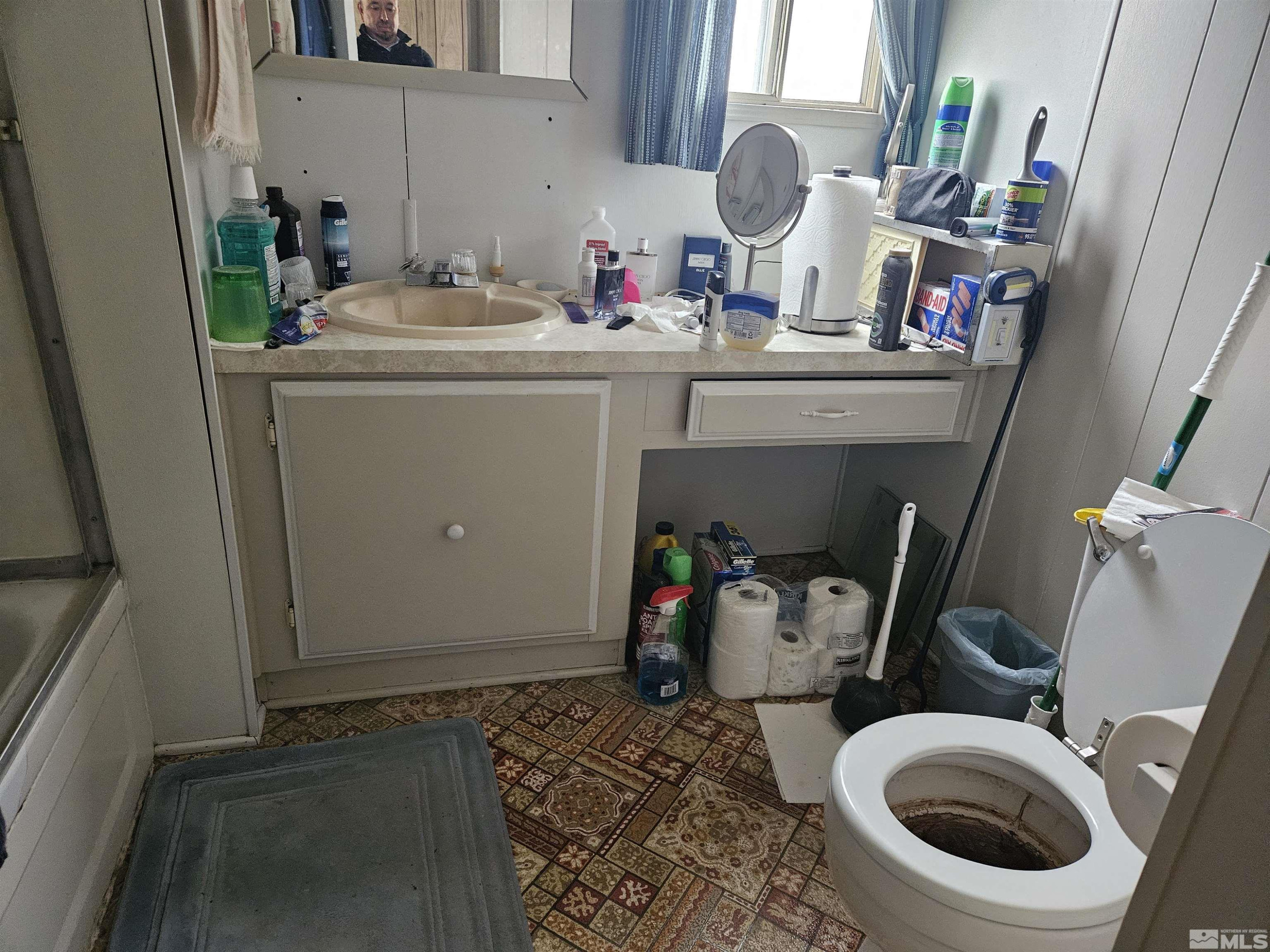 3765 Hummingbird Drive Reno, NV 89508 - Photo 6 of 13 a bathroom with a sink and toilet
