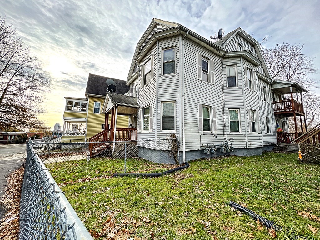 446 Liberty Street Springfield, MA 01104 - Photo 5 of 10 a front view of a house with a yard