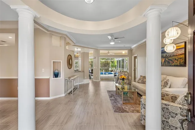 a view of a living room and dining room
