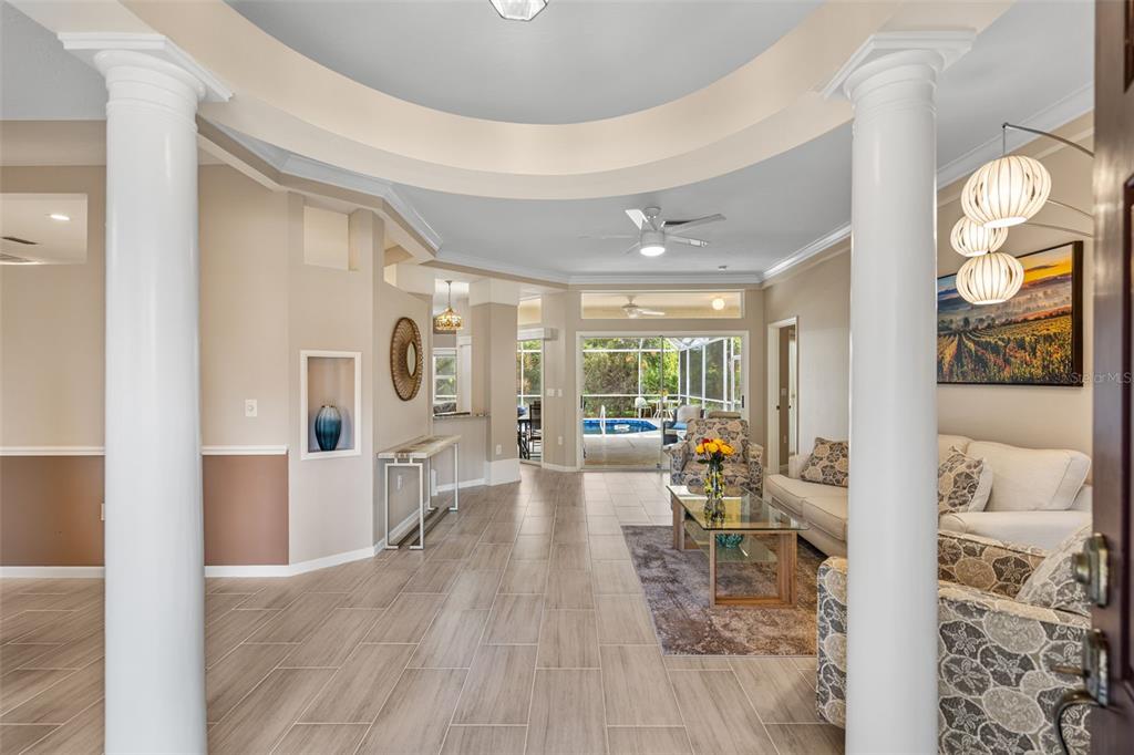 603 Pine Ranch East Road Osprey, FL 34229 - Photo 11 of 37 a view of a living room and dining room