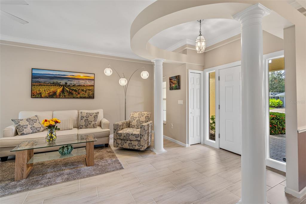 603 Pine Ranch East Road Osprey, FL 34229 - Photo 13 of 37 a living room with furniture and window