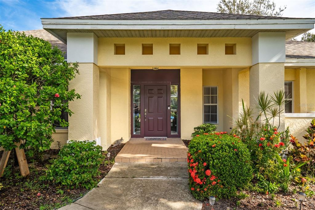 603 Pine Ranch East Road Osprey, FL 34229 - Photo 2 of 37 a front view of a house