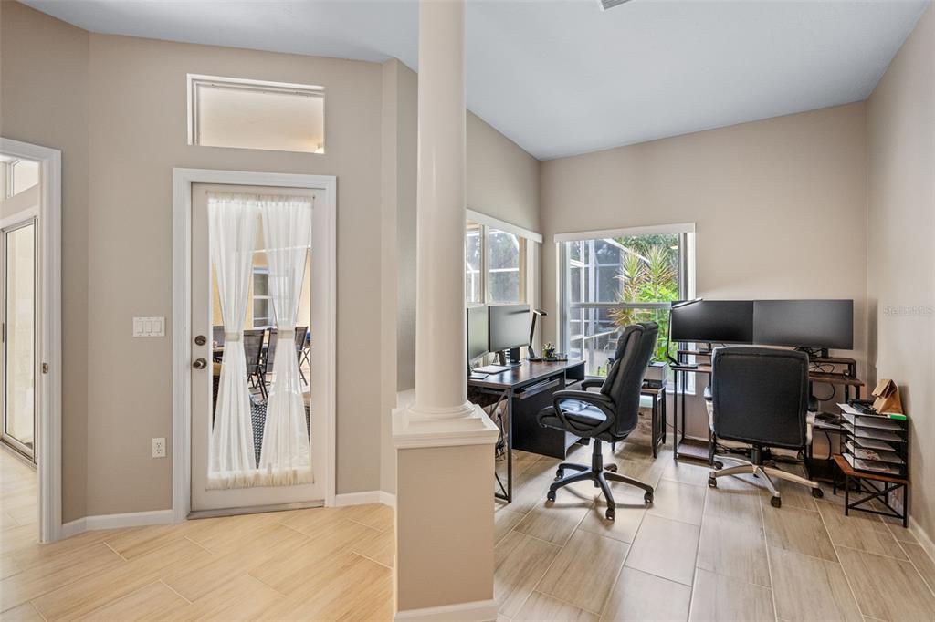 603 Pine Ranch East Road Osprey, FL 34229 - Photo 27 of 37 a workspace with furniture and a window