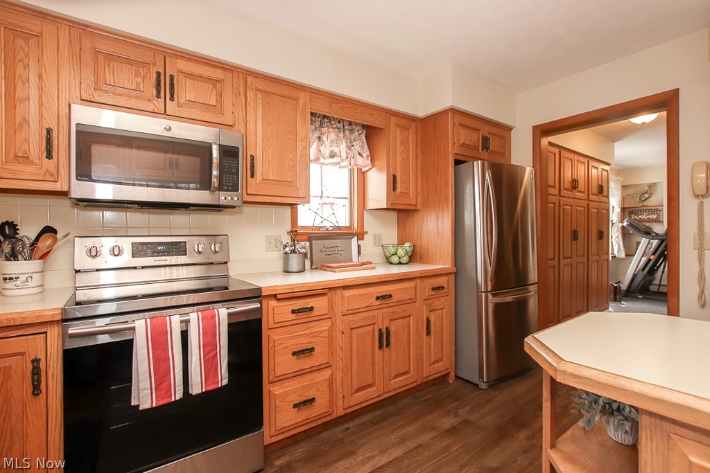 3589 Lester Road Medina, OH 44256 - Photo 9 of 35 Updated stainless steel appliances remain! LOADS OF STORAGE! Access to backdoor drop zone that has been converted into a first floor laundry. Option to have laundry in the basement.