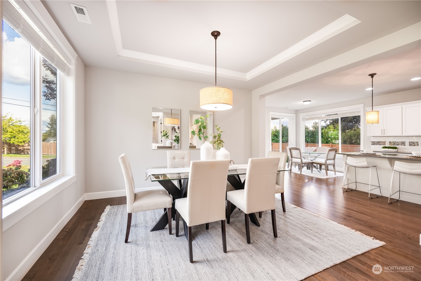 234 239th Street Southeast Bothell, WA 98021 - Photo 13 of 38 a dining room with furniture window wooden floor