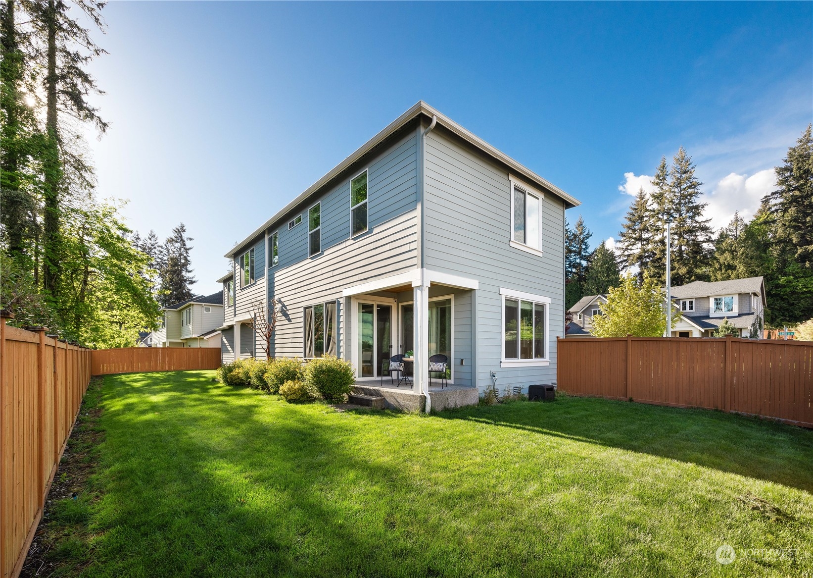 234 239th Street Southeast Bothell, WA 98021 - Photo 3 of 38 a front view of house with yard and outdoor seating
