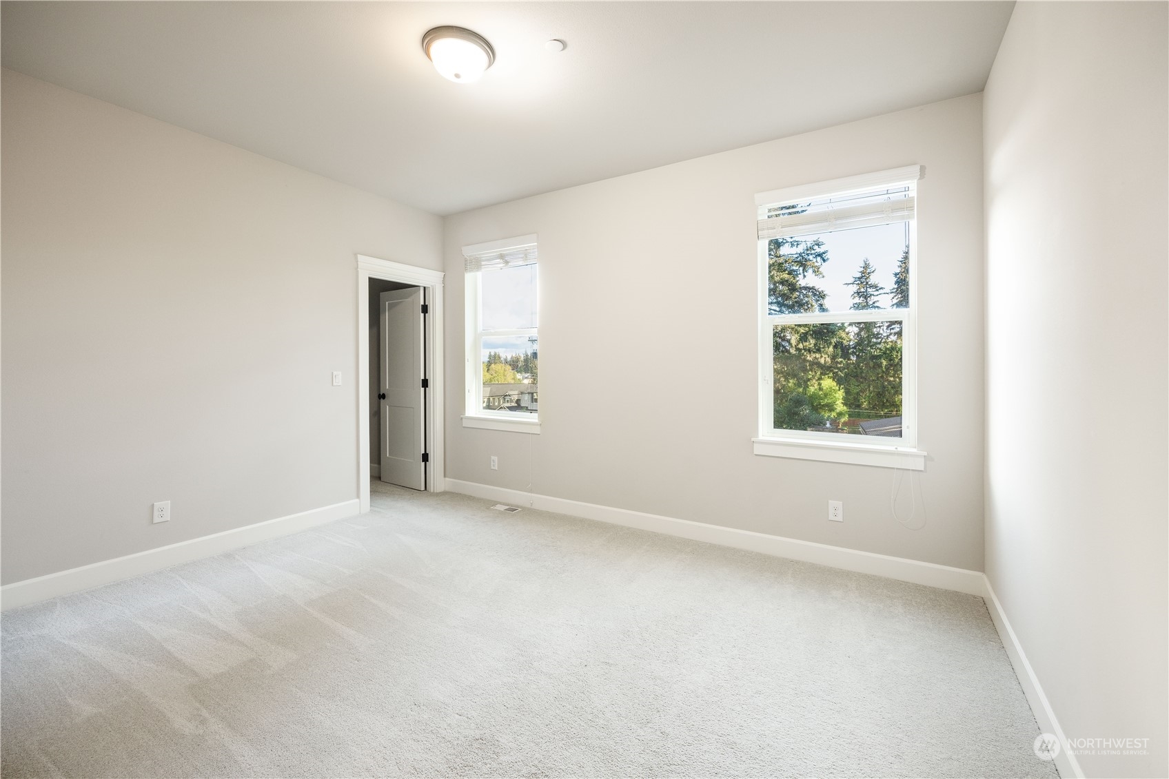 234 239th Street Southeast Bothell, WA 98021 - Photo 35 of 38 an empty room with windows and closet