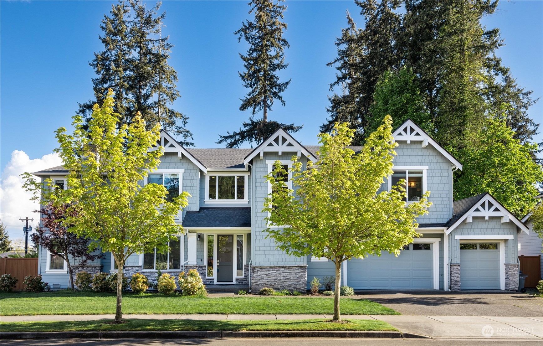 234 239th Street Southeast Bothell, WA 98021 - Photo 38 of 38 a front view of a house with a yard and garage