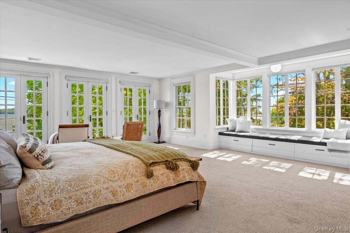 245 River Road Nyack, NY 10960 - Photo 24 of 45 Bedroom featuring carpet, crown molding, access to exterior, french doors, and beamed ceiling