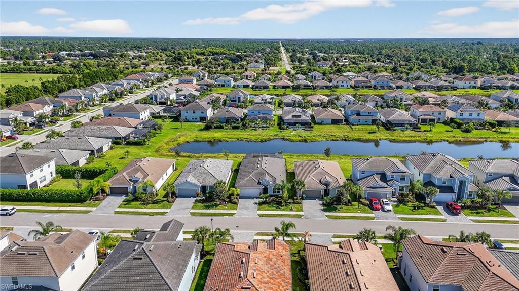 2130 Hamlin Street Naples, FL 34120 - Photo 30 of 40 an aerial view of multiple house