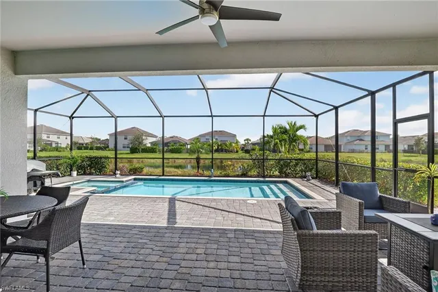 a view of a swimming pool with a porch