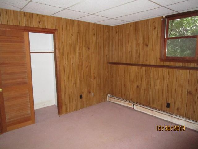 175 Woodside Road, Unit W00 West Barnstable, MA 02668 - Photo 12 of 22 a view of an empty room with a window