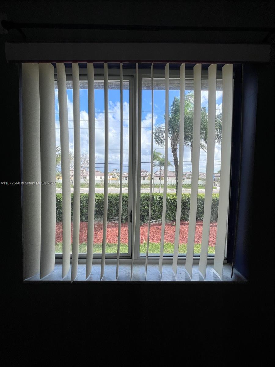 2320 Southeast 23rd Road, Unit 2320 Homestead, FL 33035 - Photo 17 of 20 a view of a city from a balcony