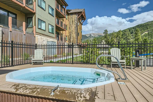 a view of a balcony with a swimming pool