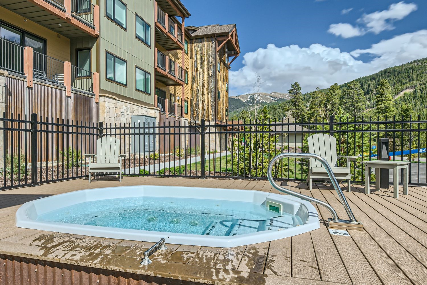 75 Clearwater Way, Unit 302 Keystone, CO 80435 - Photo 20 of 36 a view of a balcony with a swimming pool