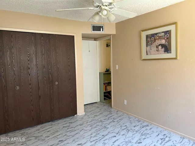 wooden floor in an empty room and a window