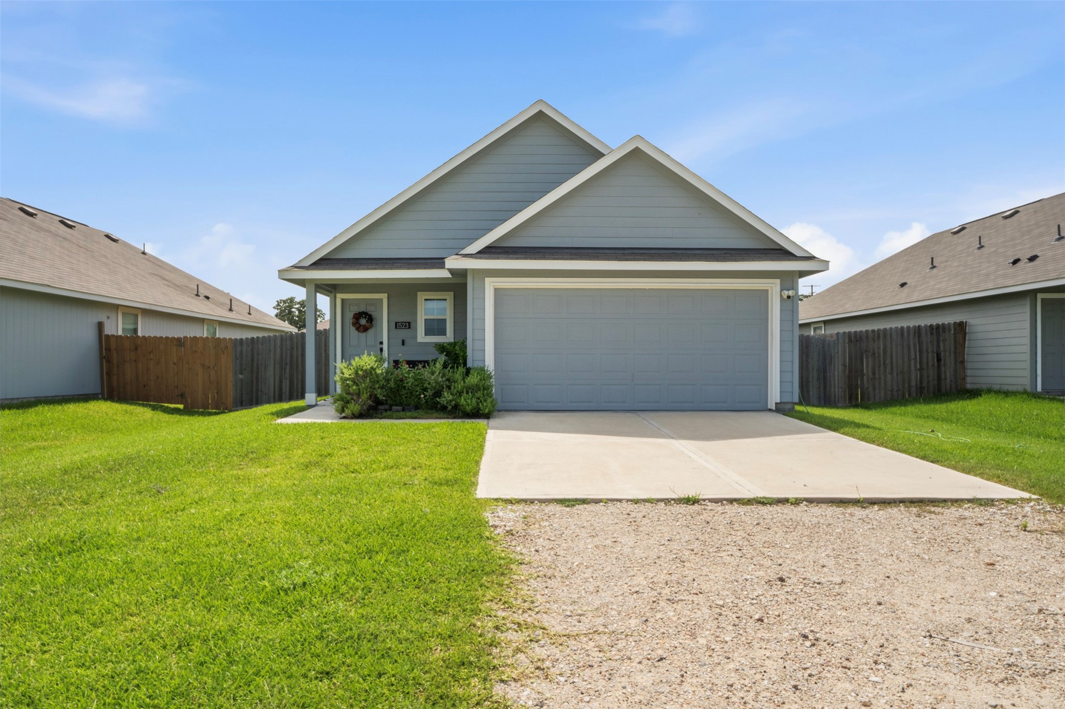 1523 22nd Street Hempstead, TX 77445 - Photo 1 of 26 Welcome home to this inviting exterior featuring charming curb appeal, a covered front porch, and a peaceful country setting.