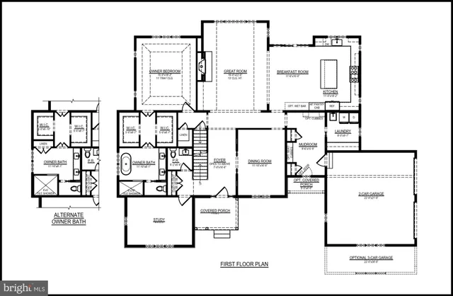 a black and white photo of a living room