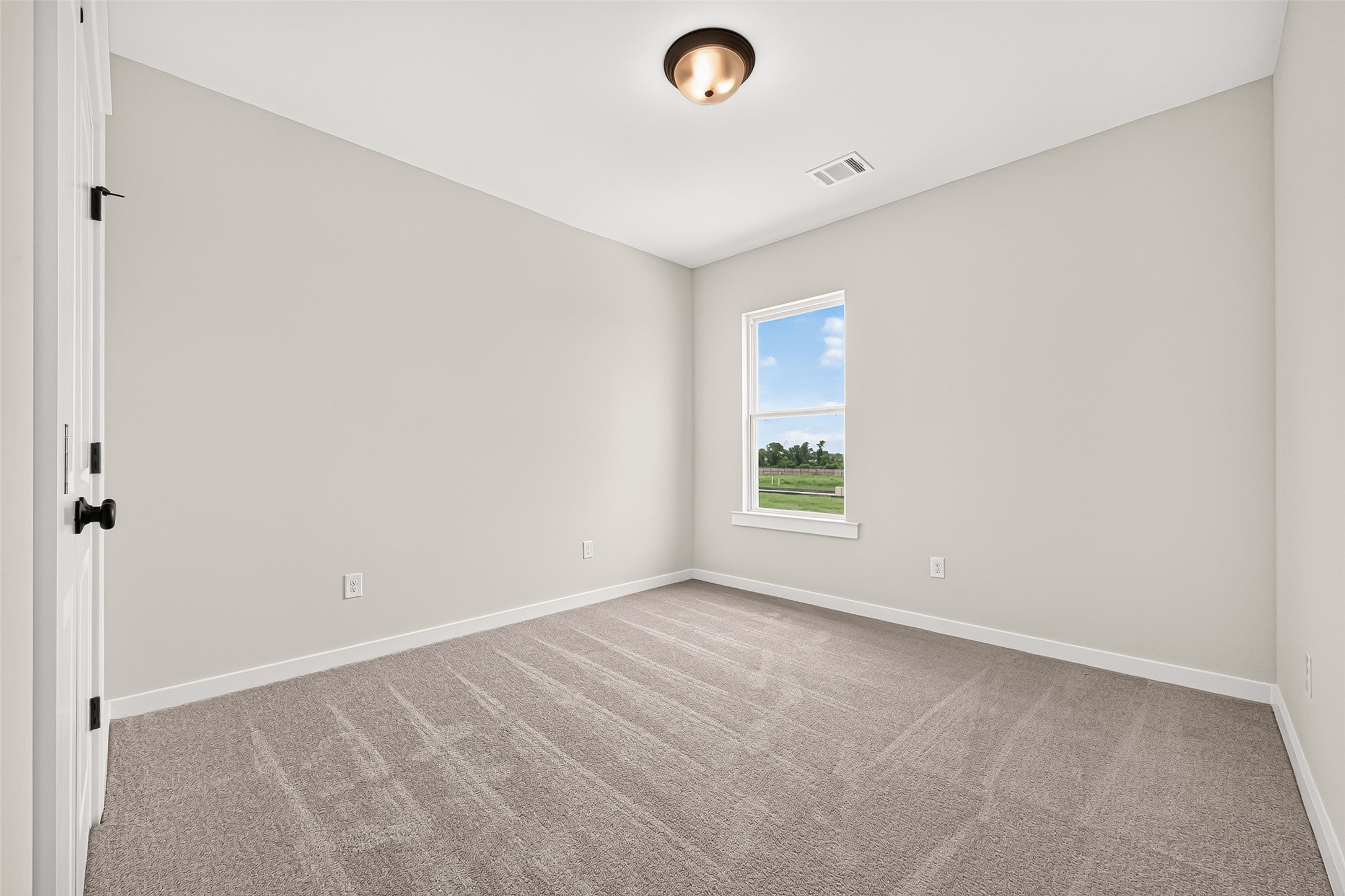 21122 Autumn Heights Rosharon, TX 77583 - Photo 39 of 42 an empty room with windows