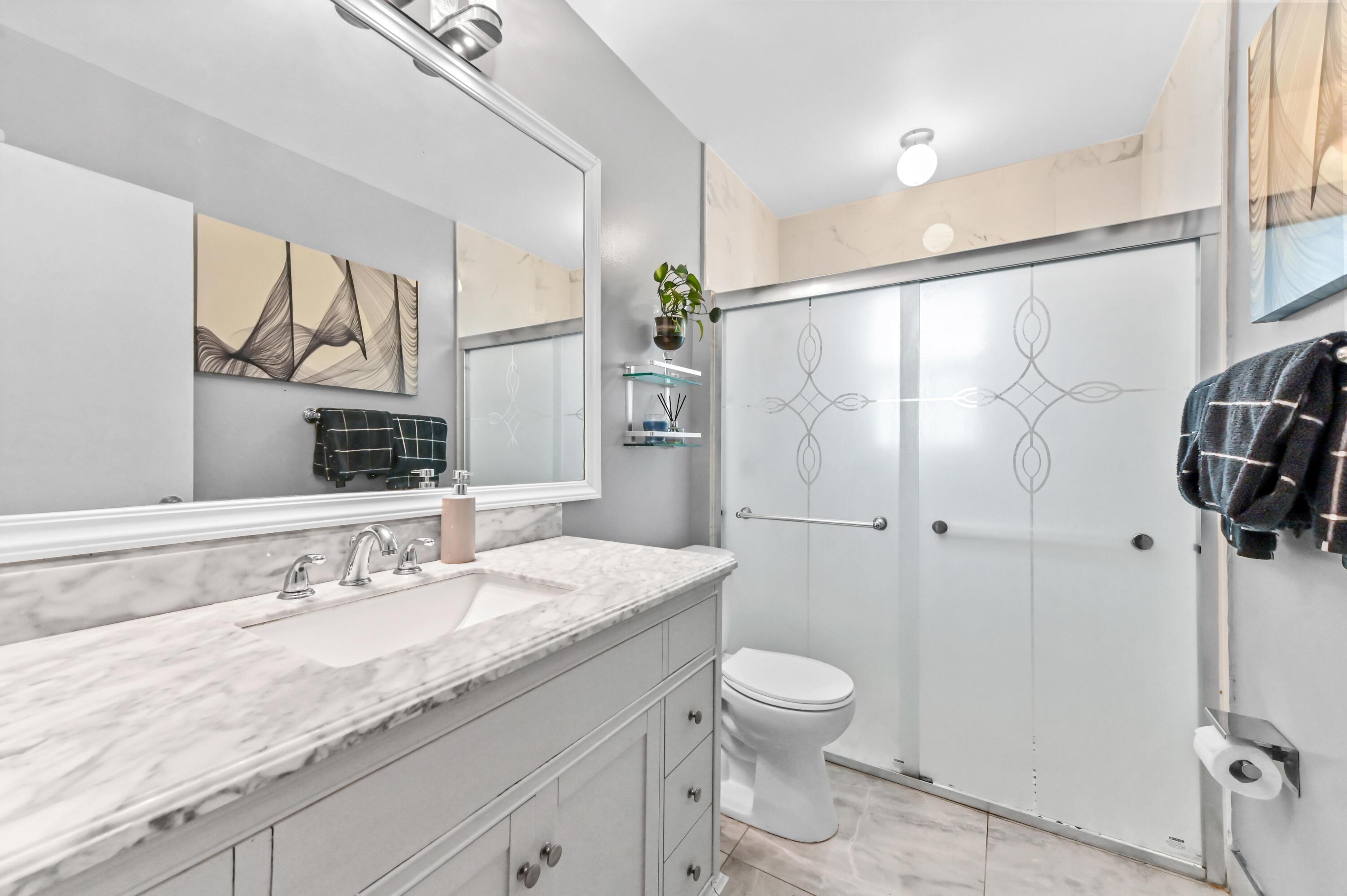 6296 Terra Rosa Circle Boynton Beach, FL 33472 - Photo 24 of 36 25 Bathroom 01