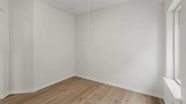 a kitchen with stainless steel appliances granite countertop a sink stove microwave and refrigerator