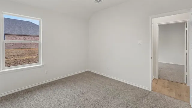 an empty room with a window