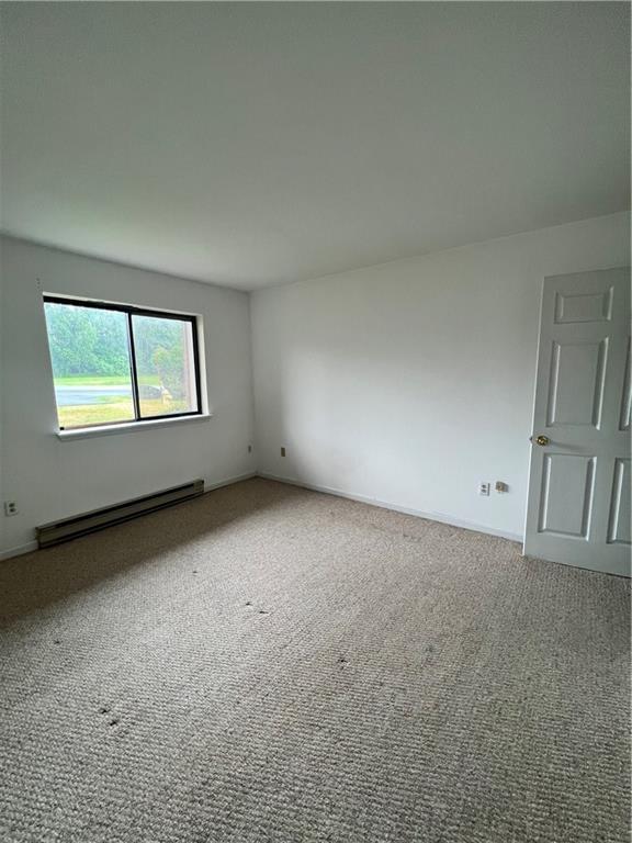 60 Davos Pointe, Unit B8 Woodridge, NY 12789 - Photo 4 of 6 an empty room with windows