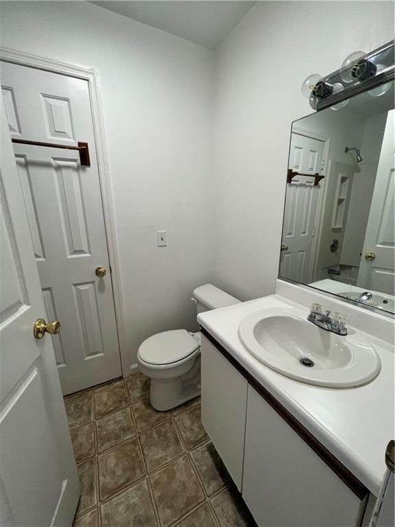 60 Davos Pointe, Unit B8 Woodridge, NY 12789 - Photo 6 of 6 a bathroom with a sink toilet and shower