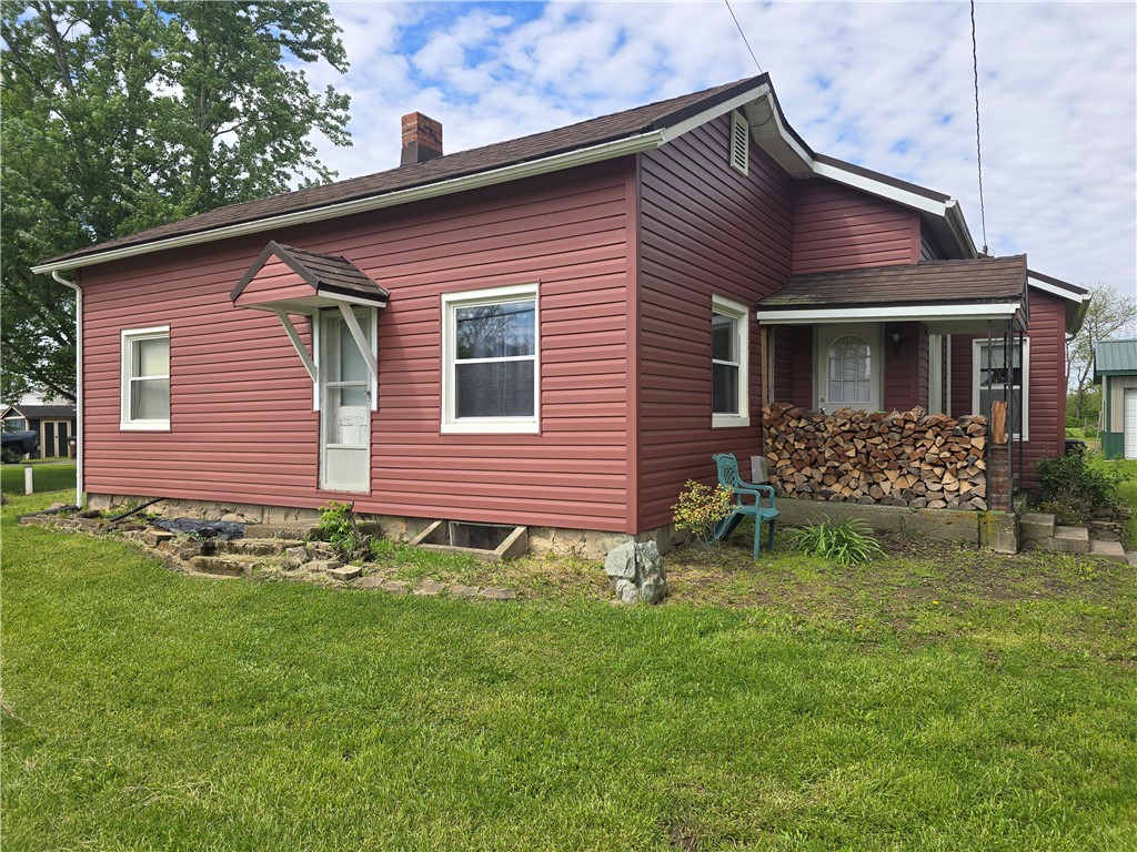 457 Wolf Road West Alexandria, OH 45381 - Photo 1 of 28 This charming residence features classic siding and a welcoming porch, nestled in a verdant setting.
