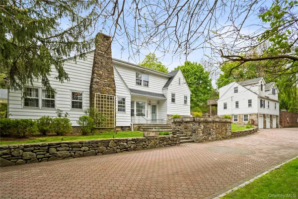 front view of a house with a street
