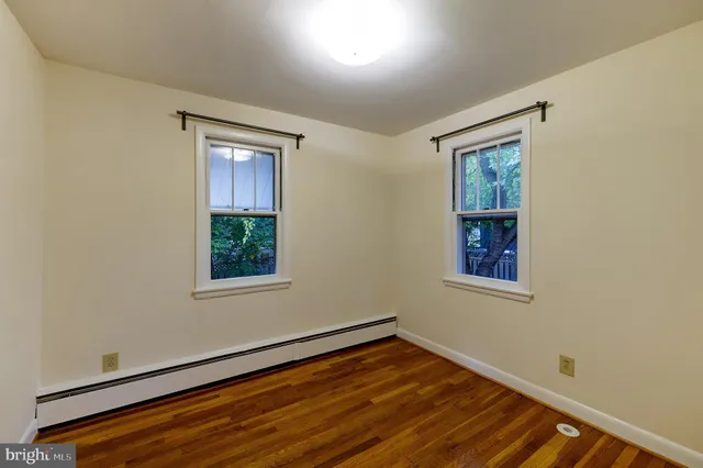 an empty room with window