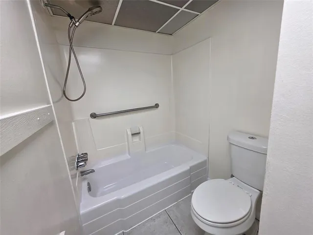 a bathroom with a sink and washing machine