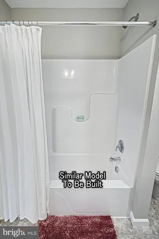 a view of a bathroom with a shower