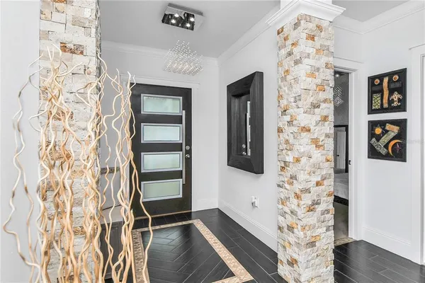walk in closet with wooden floor