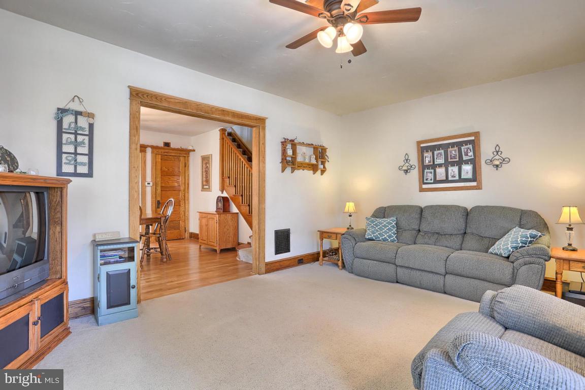 306 East New Street Lititz, PA 17543 - Photo 11 of 31 a living room with furniture and a fireplace