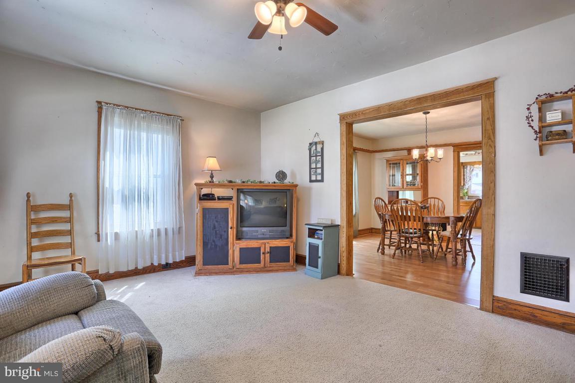 306 East New Street Lititz, PA 17543 - Photo 12 of 31 a livingroom with furniture and a chandelier