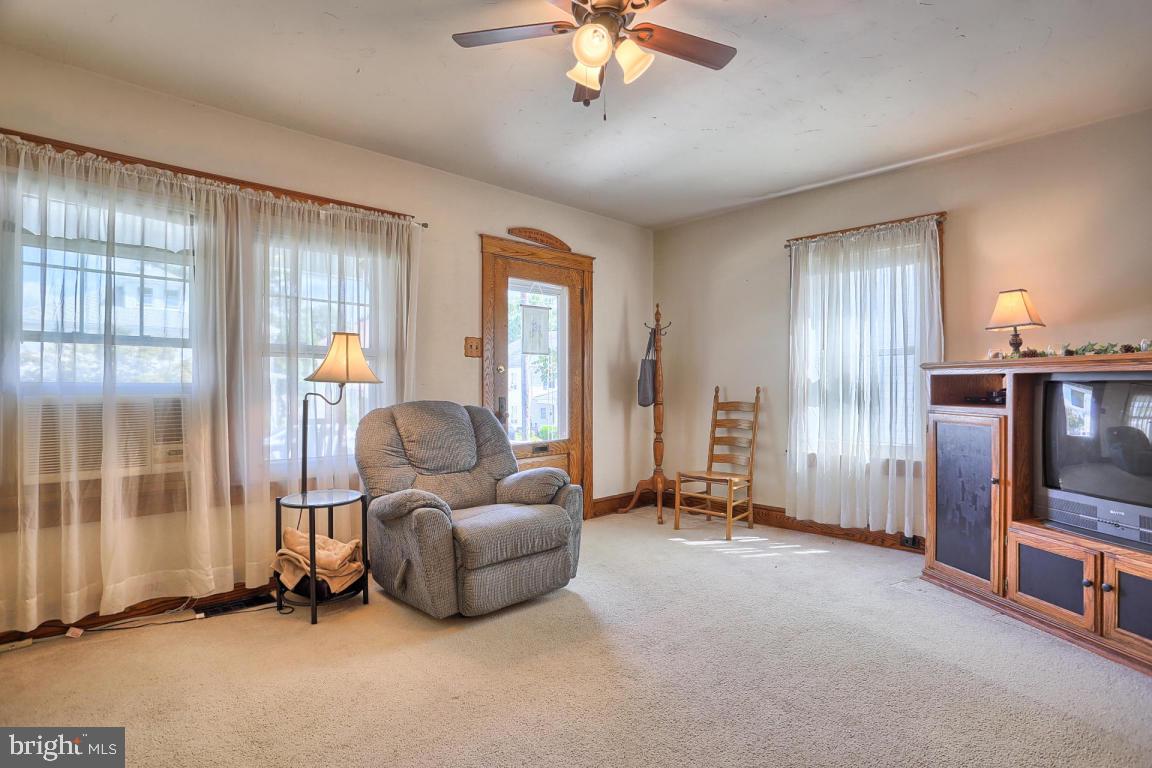 306 East New Street Lititz, PA 17543 - Photo 13 of 31 a living room with furniture and a flat screen tv