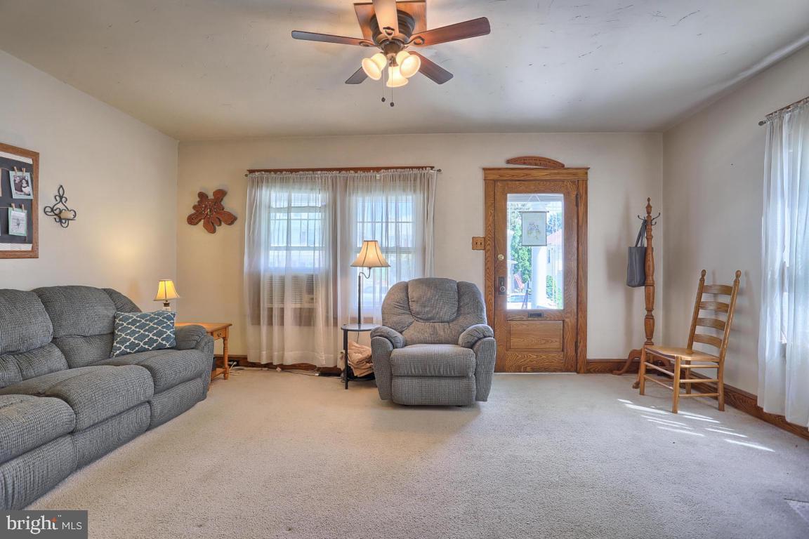 306 East New Street Lititz, PA 17543 - Photo 14 of 31 a living room with furniture and a flat screen tv