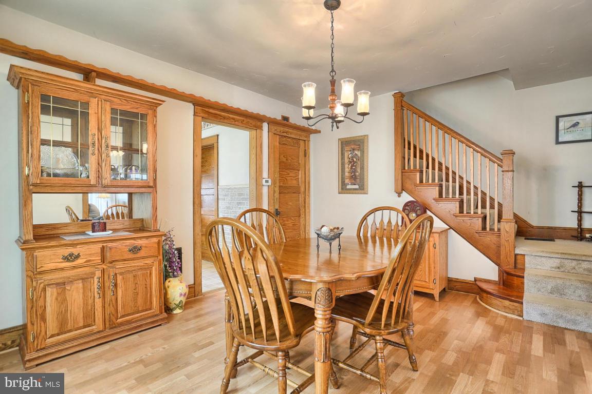 306 East New Street Lititz, PA 17543 - Photo 17 of 31 a view of a dining room with furniture window and wooden floor