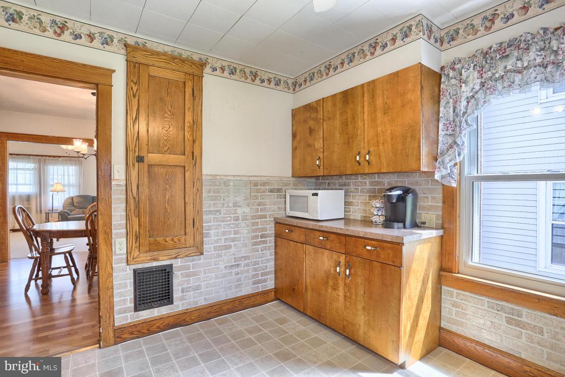 306 East New Street Lititz, PA 17543 - Photo 23 of 31 a bathroom with a sink a mirror and next to a window